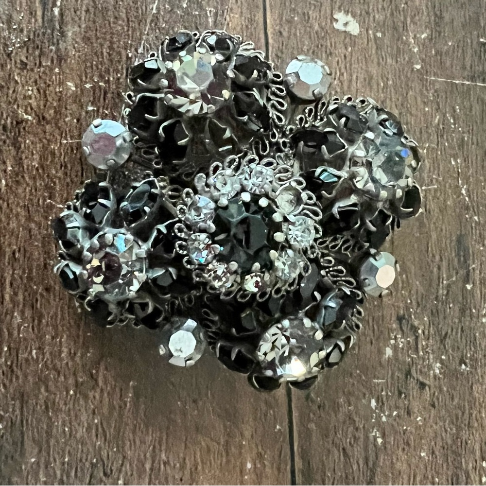 Black and silver rhinestone brooch made in Austria.
